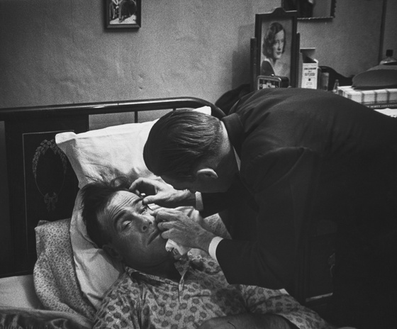 Country Doctor - Dr. Ernest Ceriani Examining Patient's Eye