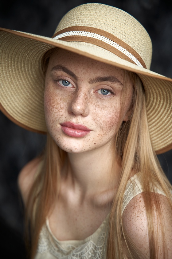 Portrait of a girl with freckles