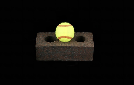 Tennis Ball Brick Isolated on Black