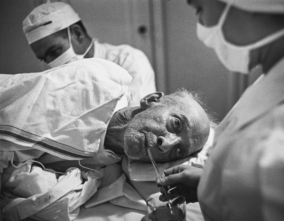 Country Doctor -  Elderly Man on Operating Table Awaiting Amputation of Gangrenous Foot