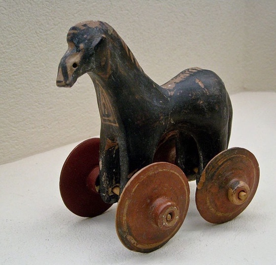 A small four-wheeled horse