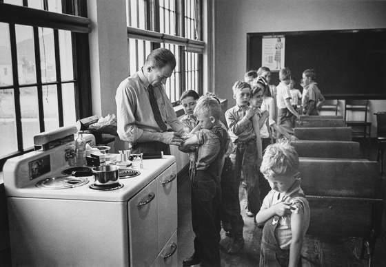 Country Doctor - Dr. Ernest Ceriani Giving Vaccinations in Classroom