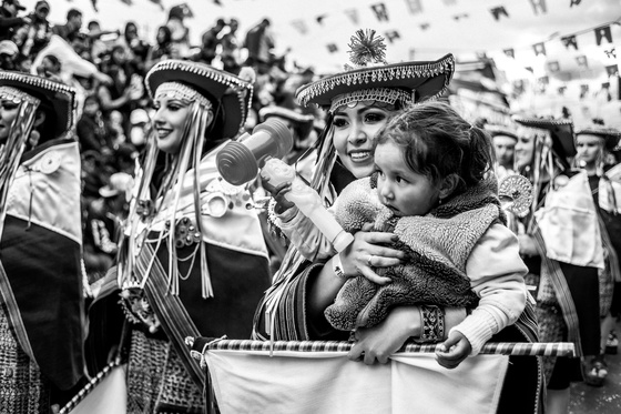 woman dances with baby