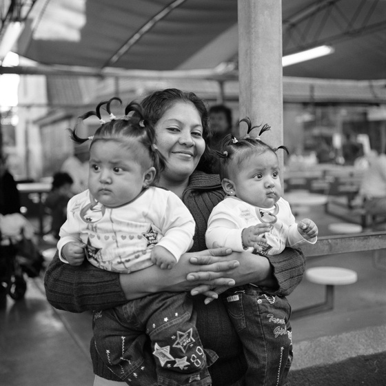 THE VILLAGE #3 MOTHER WITH TWINS by Deanna Templeton